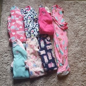 7 pairs of Footie pajamas